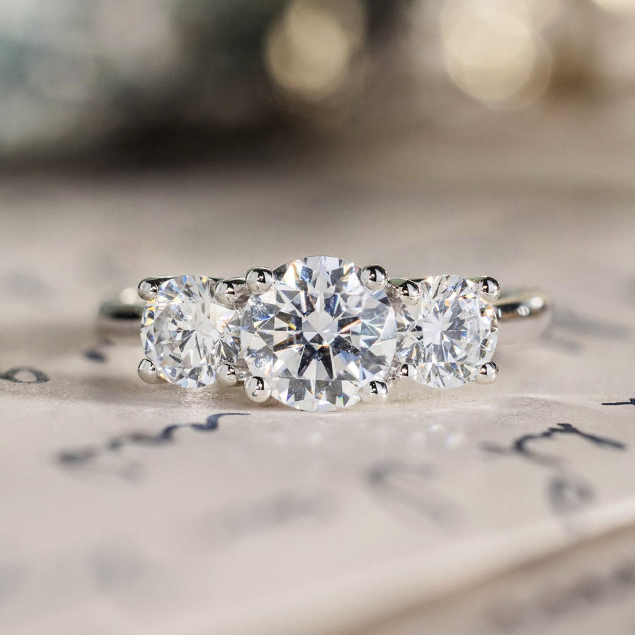 round-diamond-three-stone-engagement-ring-trilogy-the-lana-rustic-and-main