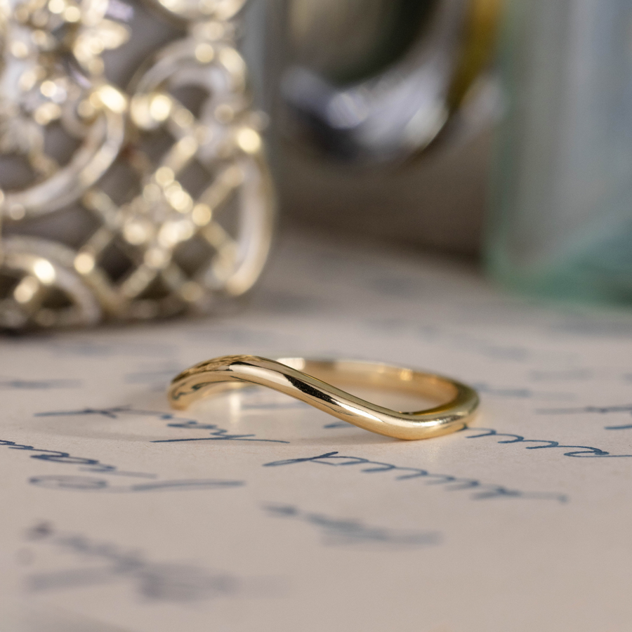 simple-curved-gold-contour-band-the-lumen-rustic-and-main