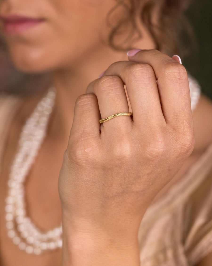 the-alouette-solid-gold-contour-wedding-band-with-milgrain-accents