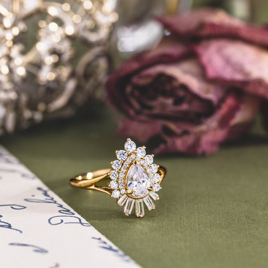 the-adele-art-deco-pear-diamond-engagement-ring-double-halo-split-shank