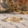 the-alouette-solid-gold-contour-wedding-band-with-milgrain-accents