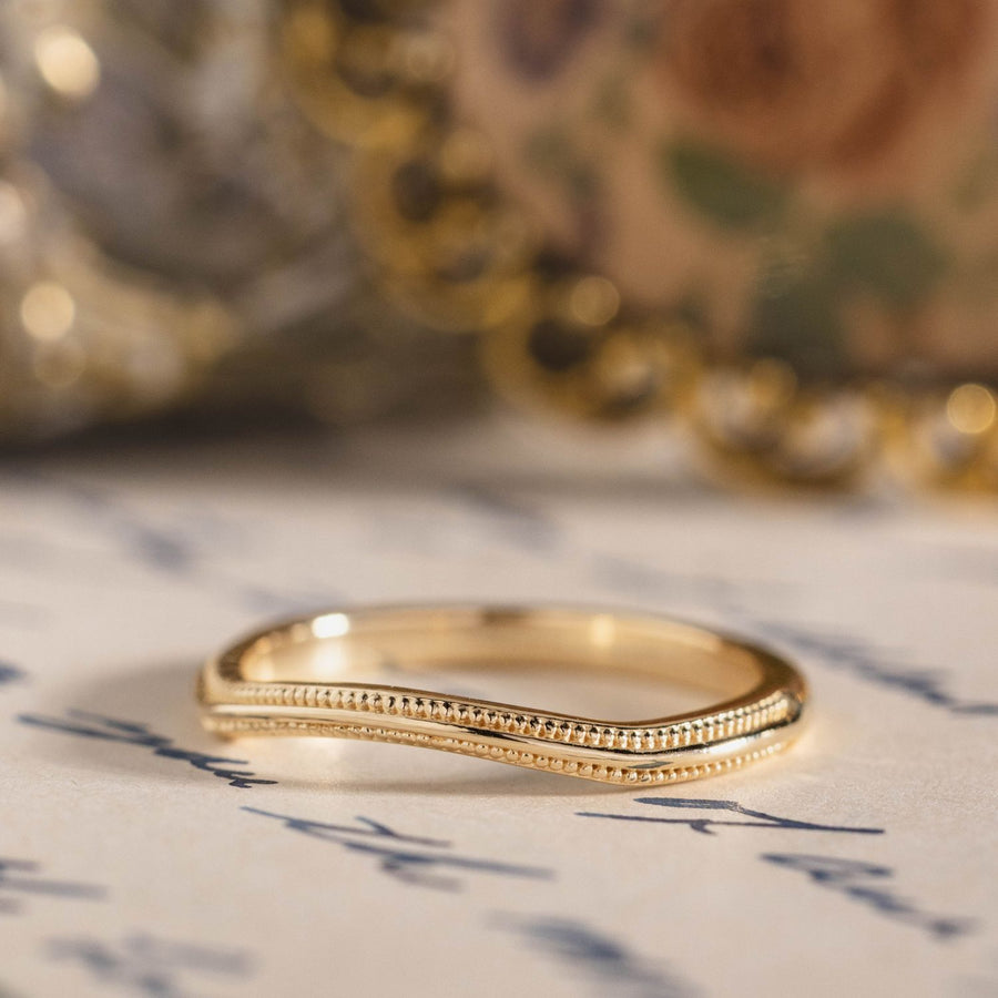 the-alouette-solid-gold-contour-wedding-band-with-milgrain-accents