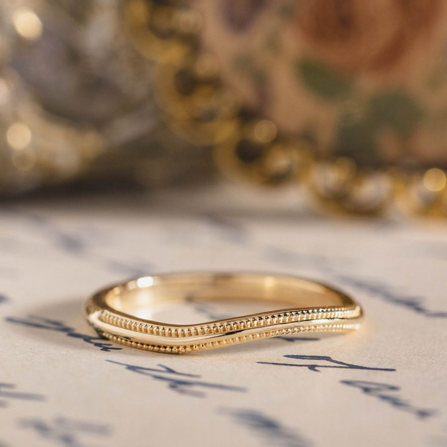 the-alouette-solid-gold-contour-wedding-band-with-milgrain-accents