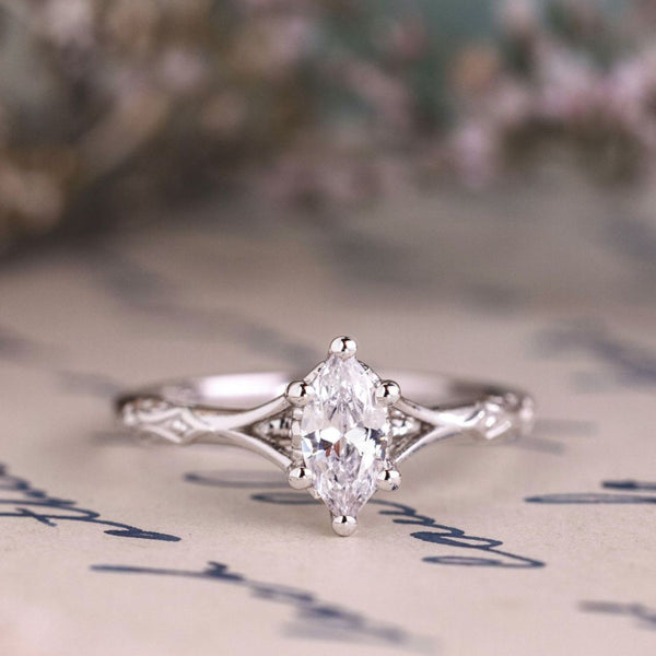 the-amdir-marquise-diamond-engagement-ring-delicate-filigree-accents