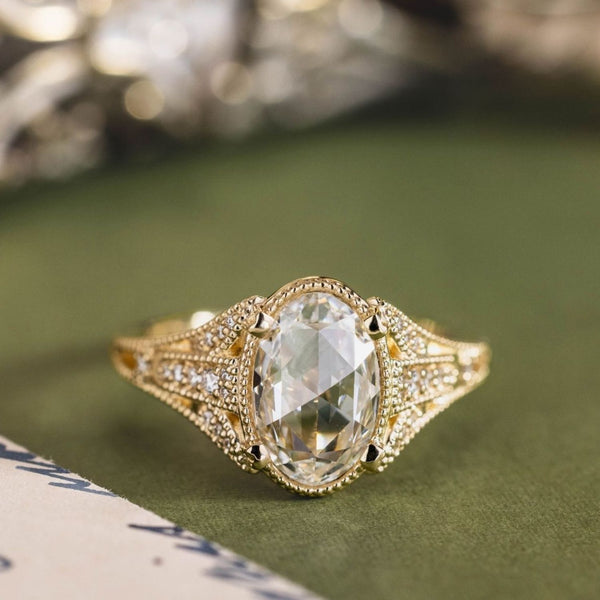 the-amelie-vintage-inspired-oval-diamond-engagement-ring-diamond-milgrain-accents