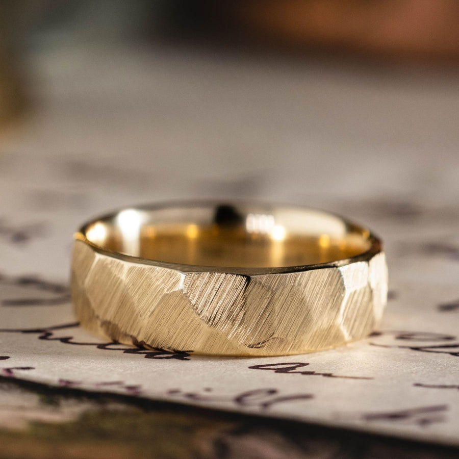 the-apollo-mens-thin-hammered-gold-wedding-band