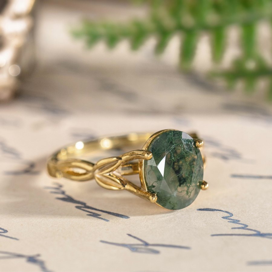 beatrix-yellow-gold-oval-moss-agate-ring-angled-side-view