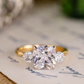 the-brooklyn-three-stone-cushion-cut-diamond-engagement-ring-round-diamond-side-stones