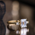 the-charlotte-three-stone-emerald-cut-diamond-engagement-ring