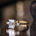 the-charlotte-three-stone-emerald-cut-diamond-engagement-ring
