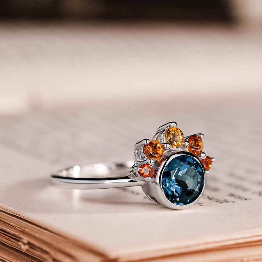 the-cosset-natural-london-blue-topaz-engagement-ring-citrine-crown-accent-bezel-setting
