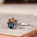 the-cosset-natural-london-blue-topaz-engagement-ring-citrine-crown-accent-bezel-setting