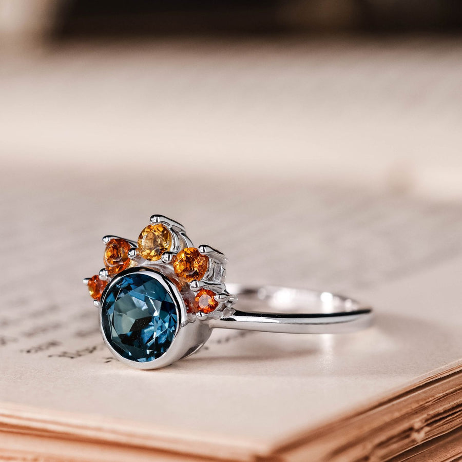the-cosset-natural-london-blue-topaz-engagement-ring-citrine-crown-accent-bezel-setting