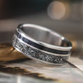 the-dark-star-mens-titanium-wedding-band-black-meteorite-whiskey-barrel-wood