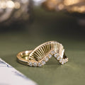 the-dawn-art-deco-inspired-v-shaped-contour-band-diamond-accents