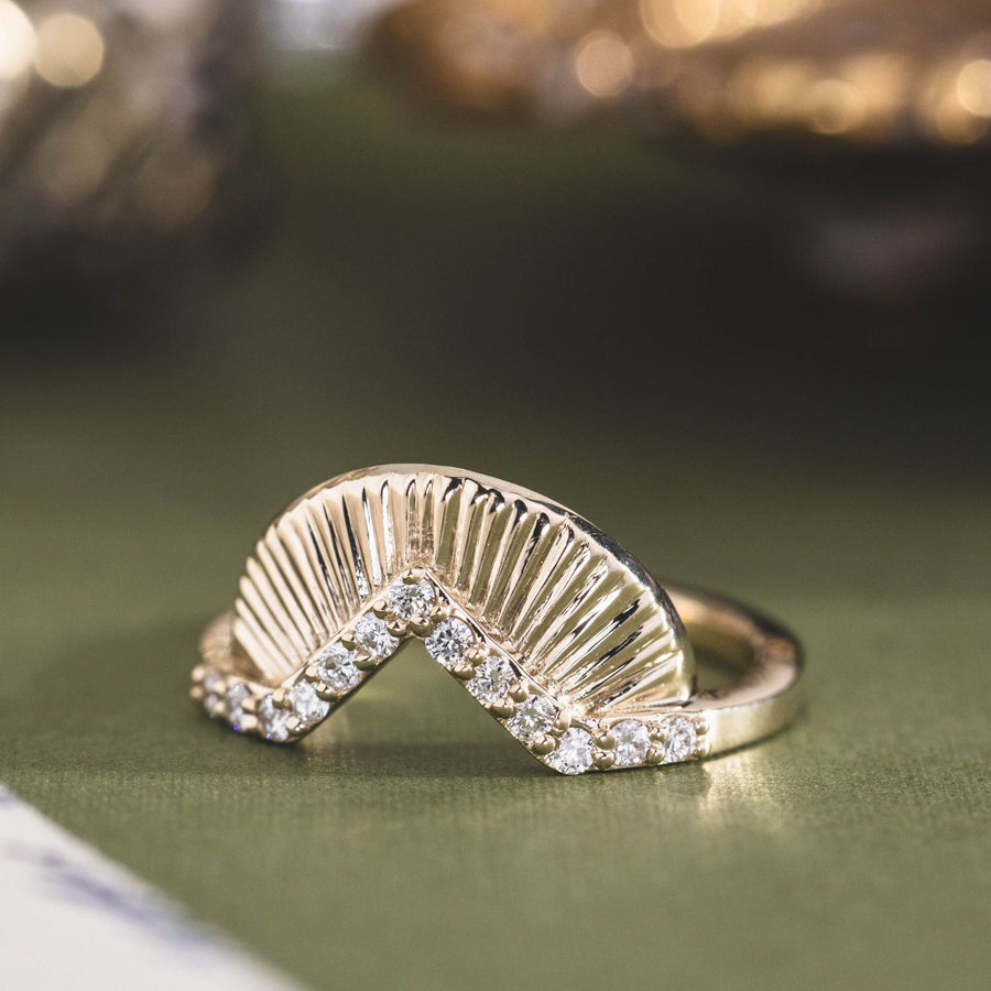 the-dawn-art-deco-inspired-v-shaped-contour-band-diamond-accents