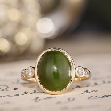 the-delfi-oval-nephrite-jade-ring-bezel-setting-diamond-accents
