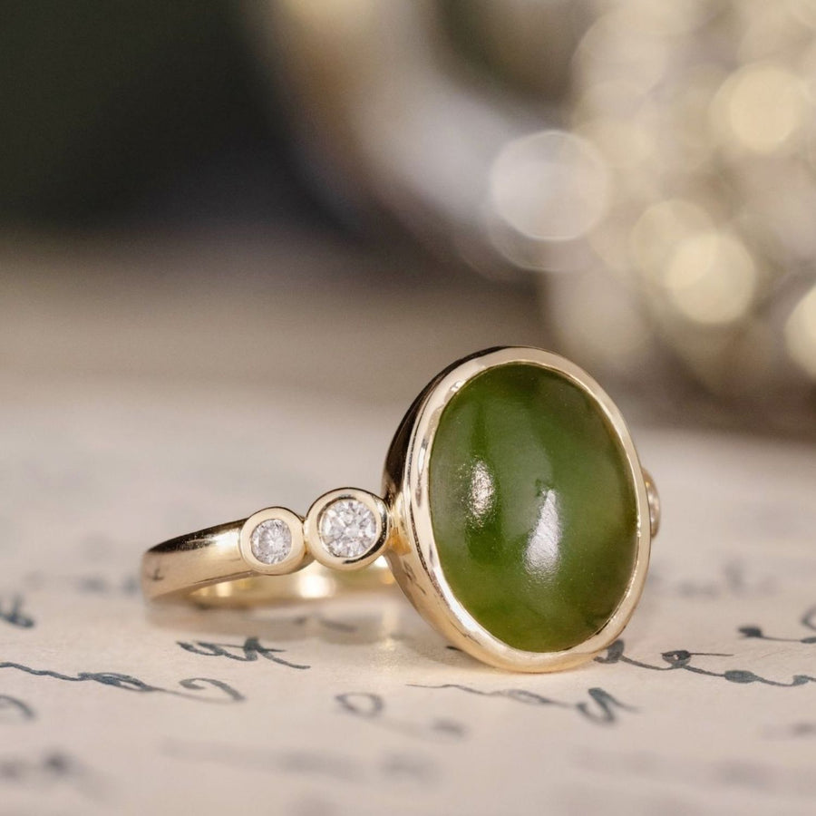 the-delfi-oval-nephrite-jade-ring-bezel-setting-diamond-accents