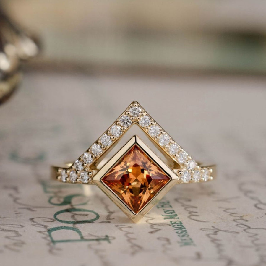 the-eileen-art-deco-inspired-princess-cut-padparadscha-sapphire-engagement-ring-diamond-accents