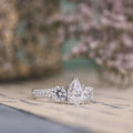 the-elenor-three-stone-pear-two-row-diamond-engagement-ring