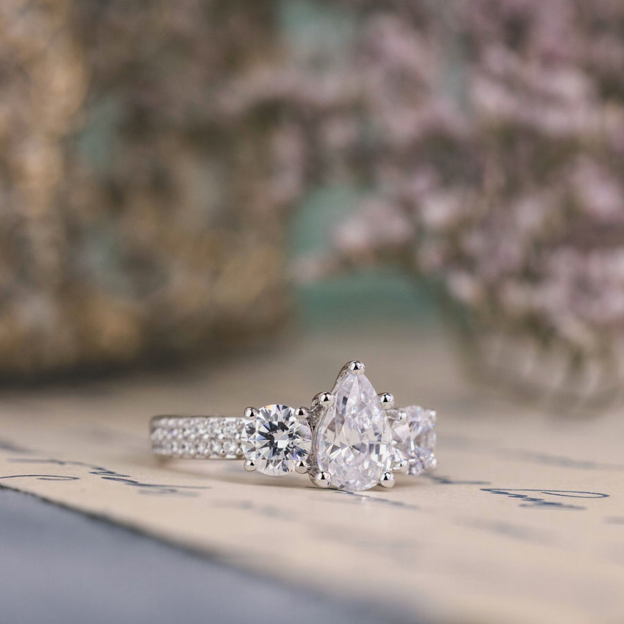 the-elenor-three-stone-pear-two-row-diamond-engagement-ring