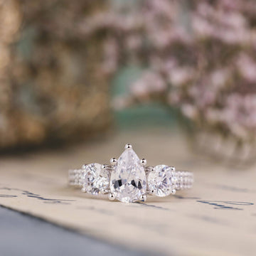 the-elenor-three-stone-pear-two-row-diamond-engagement-ring