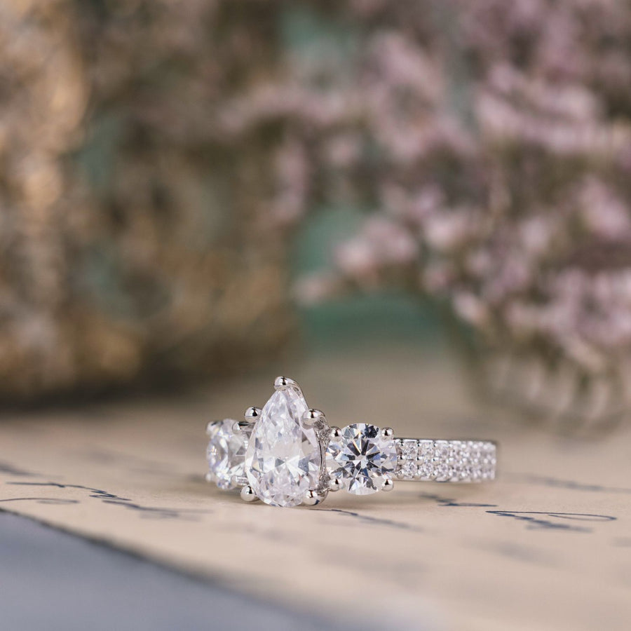the-elenor-three-stone-pear-two-row-diamond-engagement-ring