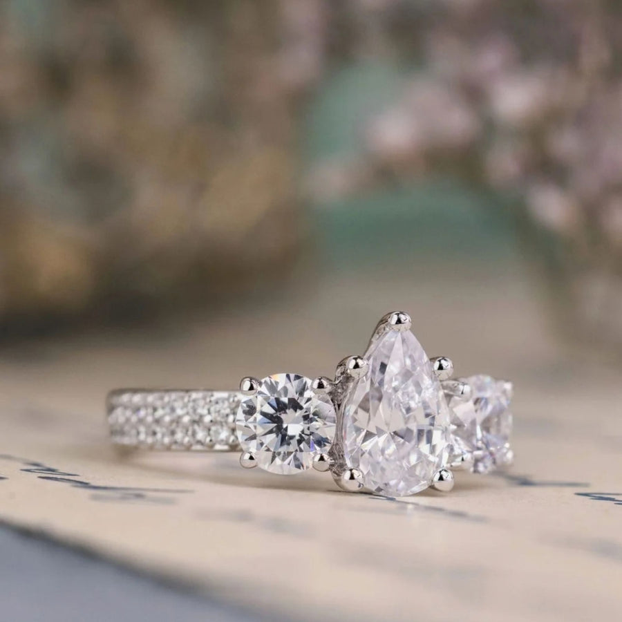 the-elenor-three-stone-pear-two-row-diamond-engagement-ring-rustic-and-main