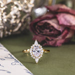 The Eliza – Vintage-Inspired Oval Diamond Ring with Pear & Round Diamond Starburst Halo
