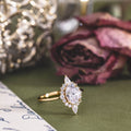 the-eliza-vintage-inspired-oval-diamond-ring-starburst-halo