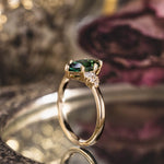 the-guinevere-green-sapphire-marquise-cut-engagement-ring-with-diamond-accents
