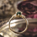 the-guinevere-green-sapphire-marquise-cut-engagement-ring-with-diamond-accents