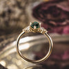 the-guinevere-green-sapphire-marquise-cut-engagement-ring-with-diamond-accents