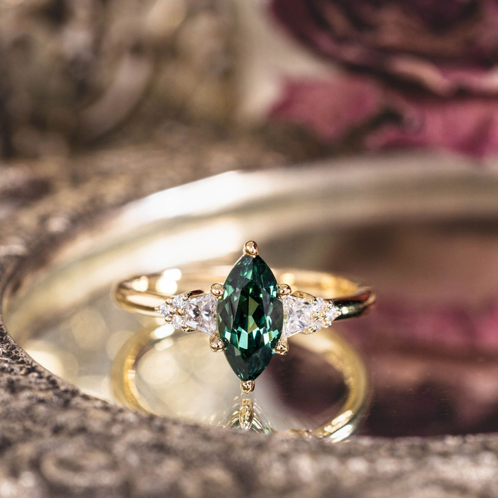 the-guinevere-green-sapphire-marquise-cut-engagement-ring-with-diamond-accents