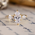 the-gwyndolyn-marquise-diamond-engagement-ring-round-marquise-shaped-diamond-accents