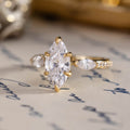the-gwyndolyn-marquise-diamond-engagement-ring-round-marquise-shaped-diamond-accents