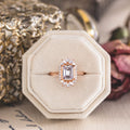 the-hazel-emerald-cut-bezel-engagement-ring-with-diamond-halo