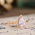 the-hope-pear-shaped-diamond-engagement-ring-diamond-halo