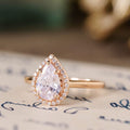 the-hope-pear-shaped-diamond-engagement-ring-diamond-halo