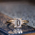 The Isabella | Emerald Diamond Engagement Ring with Baguette and Round Diamond Accents