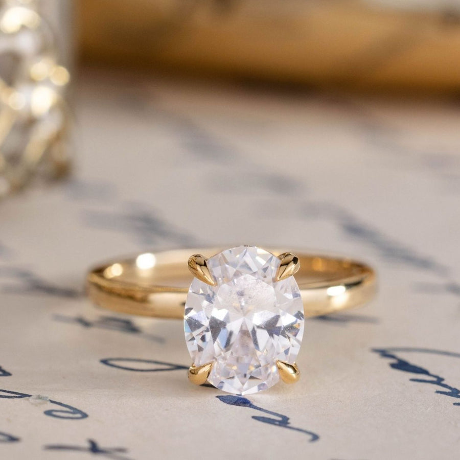 the-jolene-oval-diamond-engagement-ring-diamond-hidden-halo