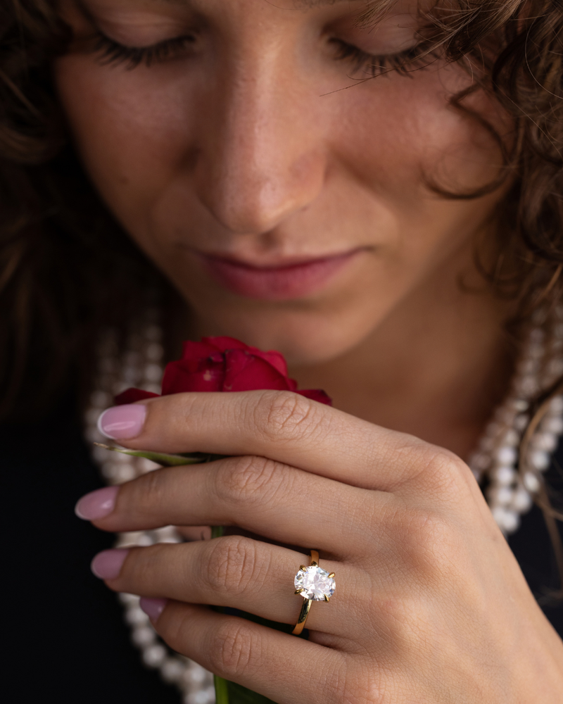 Oval Diamond Solitaire with Hidden Diamond Halo
