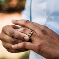The Jurassic in Gold | Men's Gold Wedding Band with Dinosaur Bone, Meteorite & Fossilized Amber