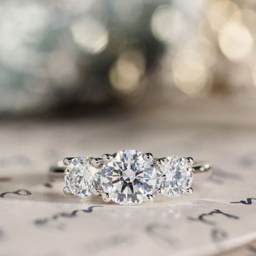 the-lana-three-stone-round-diamond-engagement-ring