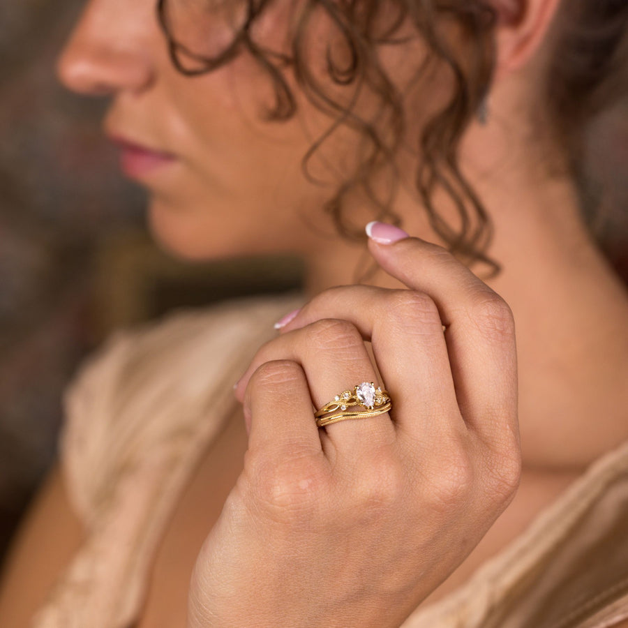 the-larkwood-alouette-pear-diamond-milgrain-contour-bridal-set-rustic-and-main