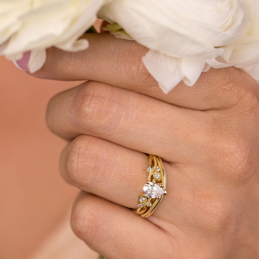 the-larkwood-alouette-pear-diamond-milgrain-contour-bridal-set-rustic-and-main