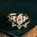 the-laurel-in-marquise-nature-inspired-laurel-marquise-diamond-engagement-ring-diamond-accents-contour-band-bridal-set