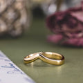 the-leah-solid-gold-v-shaped-contour-wedding-band