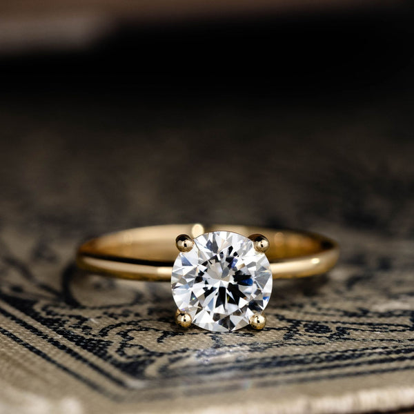 the-lora-round-solitaire-engagement-ring-delicate-nature-inspired-setting
