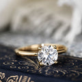 the-lora-round-solitaire-engagement-ring-delicate-nature-inspired-setting